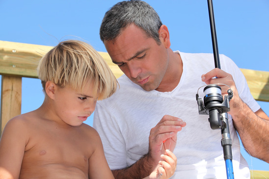 father and son fishing moment